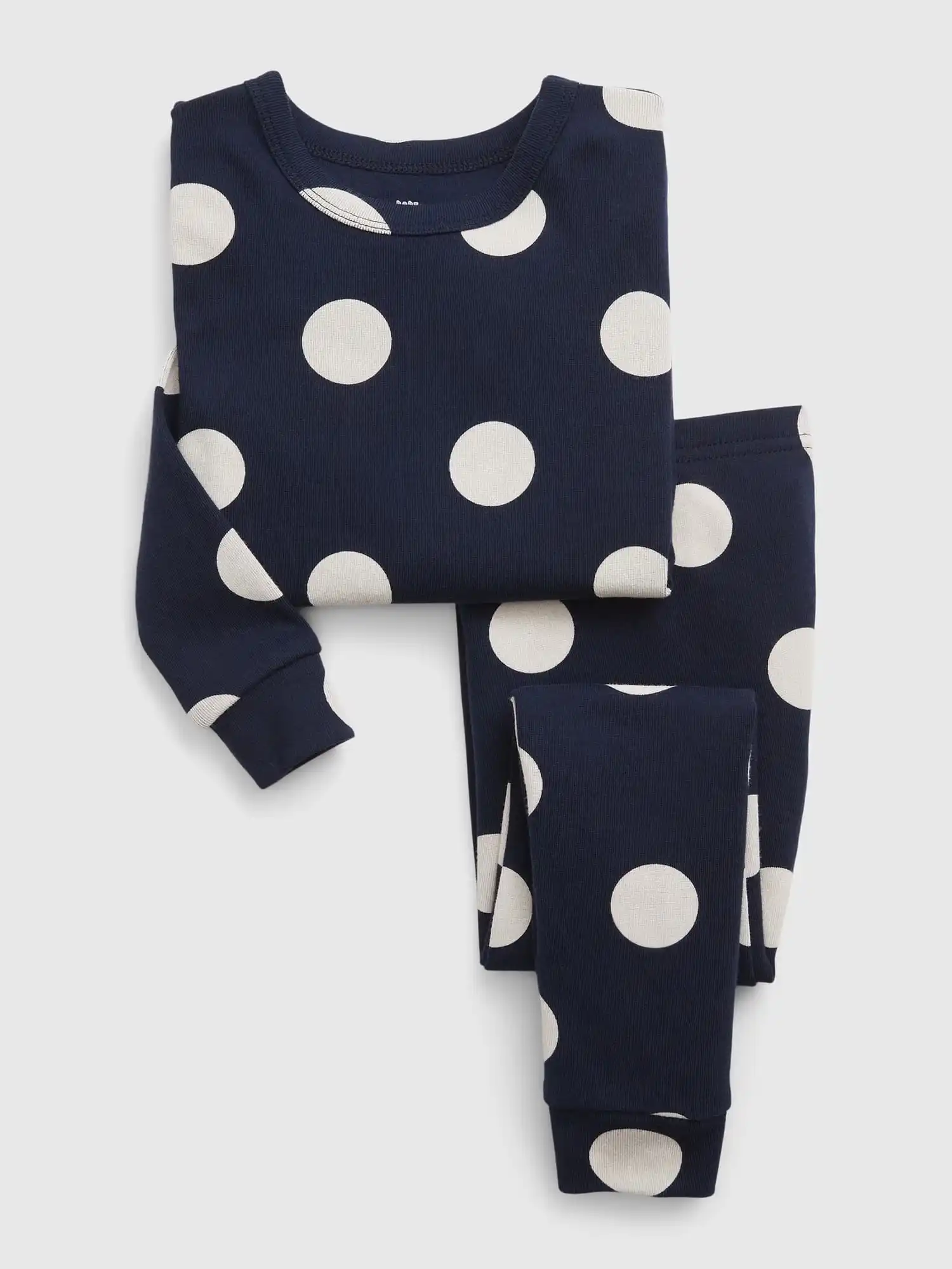 Black pajamas with white polka dots.
